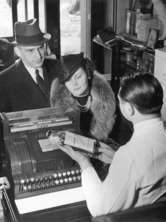 Couple Picking Up Prescription in Pharmacy